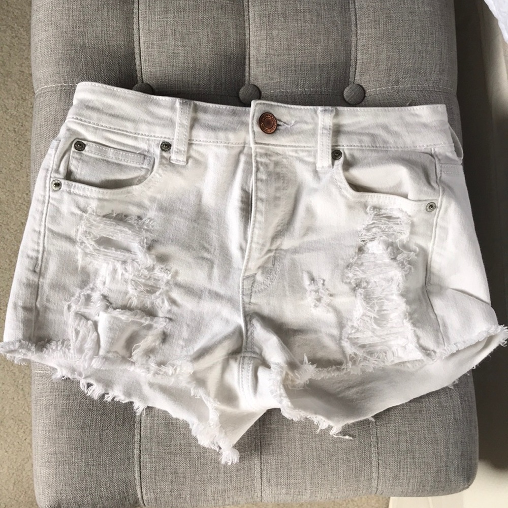 Ripped white jean shorts